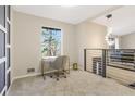 Cozy home office space with a window and carpet at 4064 Chimney Ridge Way, Ellenwood, GA 30294