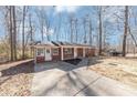 Brick ranch house with a large yard at 7771 Mattie Mccoy Ln, Winston, GA 30187