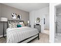 Comfortable main bedroom with carpeted floors and en-suite bathroom access at 2656 Brookview Nw Ln, Atlanta, GA 30318