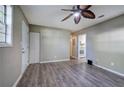 Living room with grey walls and wood-look flooring at 3460 Meadowview Dr, Lithia Springs, GA 30122