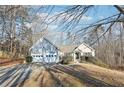 House exterior with two car garage at 245 London Ln, Hiram, GA 30141