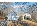 Two-car garage and landscaped yard at 245 London Ln, Hiram, GA 30141