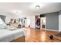 Spacious main bedroom with ensuite bathroom and hardwood floors at 1501 Old John Ward Sw Rd, Marietta, GA 30064