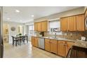 Eat-in kitchen with granite countertops and stainless steel appliances at 2947 Dunnington Cir, Chamblee, GA 30341