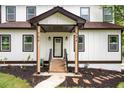 Front entrance with a covered porch and stone steps at 754 Fayetteville Se Rd, Atlanta, GA 30316