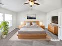 Virtually staged main bedroom with high ceilings and neutral decor at 5823 Keystone Pt, Lithonia, GA 30058
