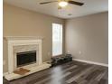 Living room with fireplace and hardwood floors at 6401 Wedgeview Ct, Tucker, GA 30084