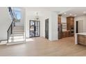 Bright, airy living room with hardwood floors, high ceilings and open floor plan at 1820 Lake Dow Rd, Mcdonough, GA 30252