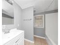 Clean bathroom with white vanity and bathtub at 281 Valley Lake Dr, Stone Mountain, GA 30087