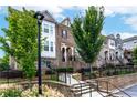 Townhouse community with brick fronts and lush landscaping at 4196 Morrison Way # 11, Atlanta, GA 30341