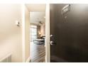 Bright entryway with view into living room and hardwood floors at 2626 Peachtree Nw Rd # 706, Atlanta, GA 30305