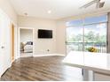 Spacious living room with sliding doors leading to balcony at 2626 Peachtree Nw Rd # 706, Atlanta, GA 30305