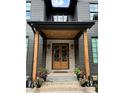 Elegant entryway with double doors and stone accents at 564 Greystone Trce, Marietta, GA 30068