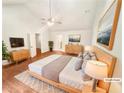 Bright main bedroom features hardwood floors, vaulted ceiling, and ensuite bathroom at 2781 Interlaken Dr, Marietta, GA 30062