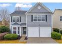 Two-story house with gray siding and a two-car garage at 4414 Weham Ct, Cumming, GA 30040