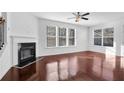 Bright living room with hardwood floors, fireplace, and large windows at , Stone Mountain, GA 30083