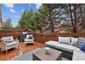 Inviting back deck featuring outdoor seating and privacy, perfect for relaxation and entertaining at 3901 Old Atlanta Station Se Dr, Atlanta, GA 30339