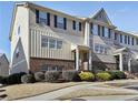 Well-maintained townhouse exterior with a combination of siding and brick accents at 3898 High Dove Sw Way # 12, Smyrna, GA 30082