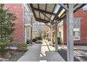 Covered walkway with brick and siding building exteriors at 1661 La France Ne St # 326, Atlanta, GA 30307