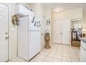 White kitchen with appliances and pantry at 120 Creekwood Dr, Woodstock, GA 30188