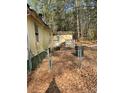 Mobile home with small deck and fenced backyard at 4197 Hwy 162, Covington, GA 30016