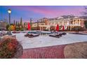 An elegant pool and lounge area offering plenty of space for entertaining at 5200 Moore Rd, Suwanee, GA 30024