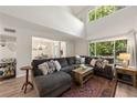 Open concept living room with sectional sofa and access to backyard at 2479 Cedar Canyon Se Rd # 2479, Marietta, GA 30067