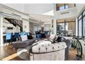 Sunlit living area featuring a large sectional sofa and city views at 260 18Th Nw St # 10226, Atlanta, GA 30363
