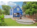 Spacious backyard with a stone patio, gazebo, and well-manicured lawn, perfect for outdoor gatherings at 930 Custer St, Atlanta, GA 30354