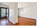 Bright entryway with hardwood floors and view into dining room at 21 Ivy Ne Rdg, Atlanta, GA 30342