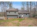 View of the back exterior, showing the back yard of the house at 54 Cross Branches, Acworth, GA 30101