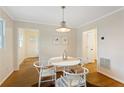 Charming dining room with hardwood floors and whitewashed furniture at 491 Monument Se Ave, Atlanta, GA 30316