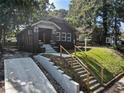 House with driveway, steps, and a landscaped yard at 994 Byron Sw Dr, Atlanta, GA 30310