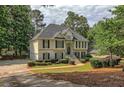 Two story house, landscaped yard, and driveway at 113 Willow Hill Ln, Stockbridge, GA 30281