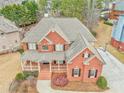 Two story home with large yard and driveway at 6037 Addington Nw Dr, Acworth, GA 30101