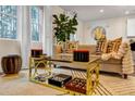 Modern living room featuring a beige sofa and a stylish coffee table at 1087 Shadow Glen Dr, Fairburn, GA 30213