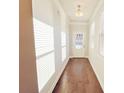 Bright entryway with hardwood floors and white trim at 2452 Pearl Ridge Trce, Buford, GA 30519