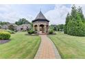 Attractive community with gazebo and manicured landscaping at 7890 Royal Melbourne Way, Duluth, GA 30097