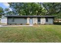 Charming ranch home with stone accents and landscaped lawn at 1669 Liberty Vly, Decatur, GA 30032