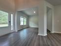 Bright entryway with hardwood floors and view to the living room at 1421 Stephens View Dr, Loganville, GA 30052