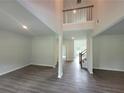 Spacious living room with high ceilings and hardwood floors at 1421 Stephens View Dr, Loganville, GA 30052