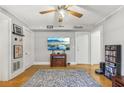 Living room with hardwood floors, a large TV, and comfortable seating at 785 Ponce De Leon Ne Pl # 8, Atlanta, GA 30306