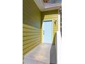 Side view of house showing light blue door at 575 Rockwell Sw St, Atlanta, GA 30310