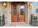 Elegant double wood doors with glass panels and sidelights at 396 15Th Street Nw # 95, Atlanta, GA 30318