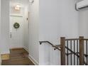 Bright hallway with wood flooring and modern staircase at 6736 Cadence Blvd, Sandy Springs, GA 30328