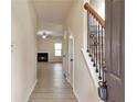 Bright entryway with hardwood floors and staircase at 2375 Morgan Farm Dr, Buford, GA 30519