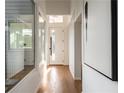 Bright entryway with hardwood floors and modern art at 2107 Abner Nw Pl, Atlanta, GA 30318