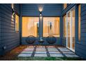 Private patio with modern chairs and a small table at 2107 Abner Nw Pl, Atlanta, GA 30318