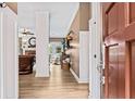 Bright entryway with hardwood floors and view to living room at 25 Highlands Way, Oxford, GA 30054