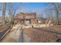 Brick home with stone patio and landscaping at 1422 Hillside Dr, Grayson, GA 30017